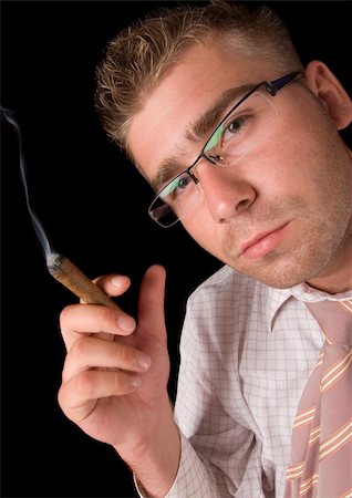 Businessman smoking cigar Stock Photo - Budget Royalty-Free & Subscription, Code: 400-04273821