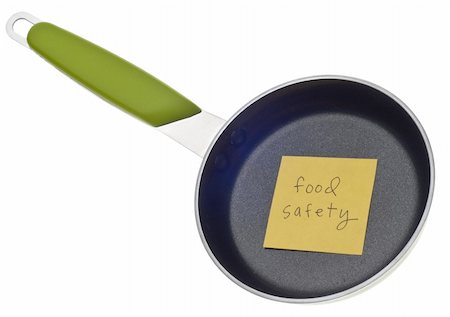 simsearch:400-05325346,k - Food Safety Concept with Frying Pan Isolated on White with a Clipping Path. Photographie de stock - Aubaine LD & Abonnement, Code: 400-04284523