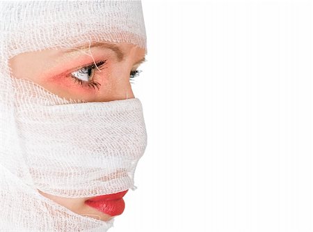 plastic wrap person - girl with bandages on her face on white Stock Photo - Budget Royalty-Free & Subscription, Code: 400-04284595