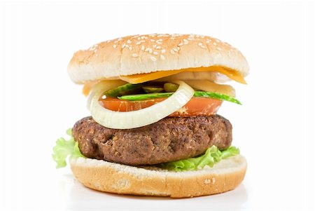 Delicious grilled burger on wheat buns isolated on a white Stock Photo - Budget Royalty-Free & Subscription, Code: 400-04284670