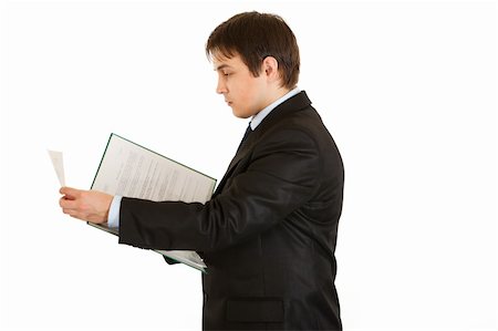 simsearch:400-05285550,k - Serious modern businessman  holding folder with documents in hand isolated on white Stockbilder - Microstock & Abonnement, Bildnummer: 400-04284925