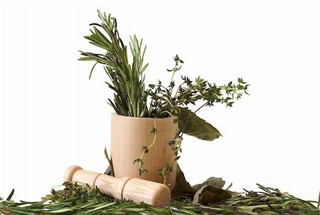 simsearch:400-04846756,k - Preparing herbs in a mortar and pestle. Stock Photo - Budget Royalty-Free & Subscription, Code: 400-04285043