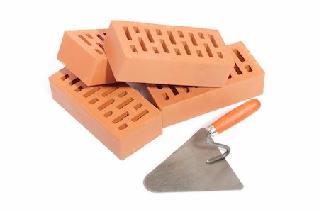 red bricks and trowel,  photo on the white background Foto de stock - Super Valor sin royalties y Suscripción, Código: 400-04285214