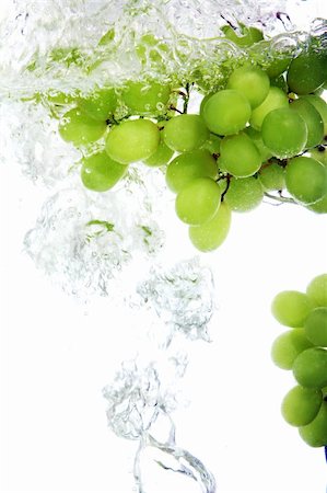 Fresh vine grape dropped into water Stock Photo - Budget Royalty-Free & Subscription, Code: 400-04285964