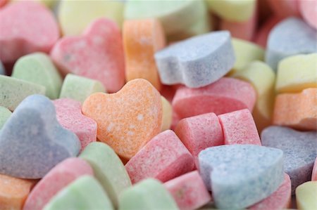 simsearch:400-04286012,k - Little colorful candy hearts background. Shallow dof Stock Photo - Budget Royalty-Free & Subscription, Code: 400-04286015