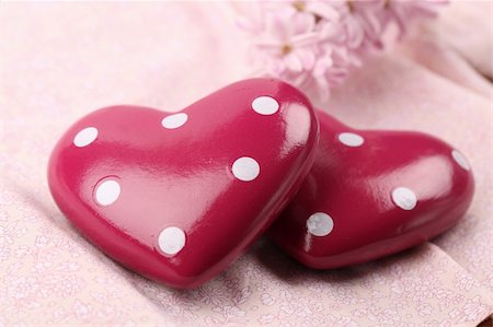 Two dotted hearts on pink background with hyacinth. Shallow dof Stock Photo - Budget Royalty-Free & Subscription, Code: 400-04286018