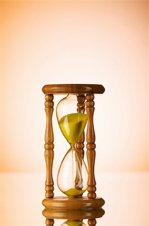 Time concept - hourglass against the gradient background Photographie de stock - Aubaine LD & Abonnement, Code: 400-04287742