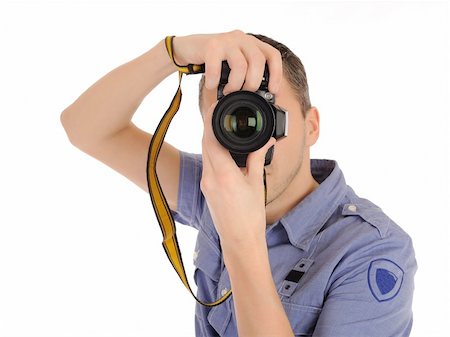 simsearch:400-04270950,k - professional male photographer taking picture . isolated on white background Stockbilder - Microstock & Abonnement, Bildnummer: 400-04288031