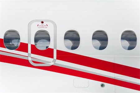 emergency exit on the fuselage of a passenger aircraft Stock Photo - Budget Royalty-Free & Subscription, Code: 400-04288050