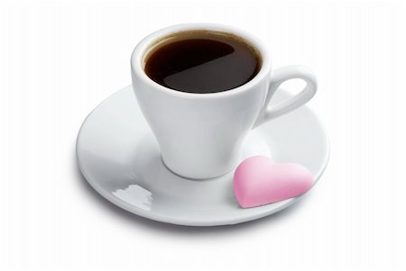 Cup of coffee with pink heart shape cookie. Isolated with clipping path on white background Fotografie stock - Microstock e Abbonamento, Codice: 400-04288298