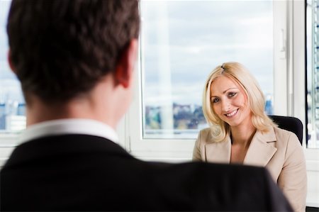 Two businesspeople at an interview in the office Stock Photo - Budget Royalty-Free & Subscription, Code: 400-04288805