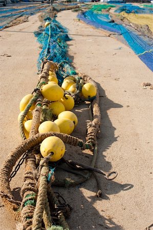 simsearch:400-05728696,k - Trawl fishing nets and tackle drying on a pier Stockbilder - Microstock & Abonnement, Bildnummer: 400-04288826