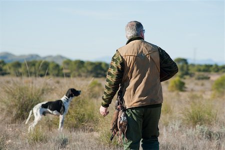 A hunter and his dog, a strong parntership Stock Photo - Budget Royalty-Free & Subscription, Code: 400-04288829