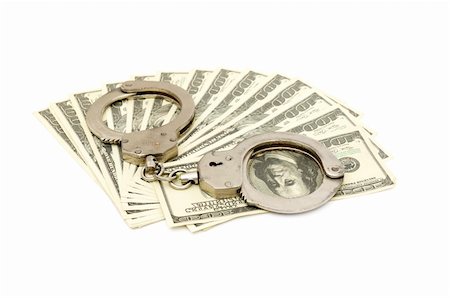 simsearch:640-02656413,k - Handcuffs on money background, business security concept Foto de stock - Super Valor sin royalties y Suscripción, Código: 400-04289069