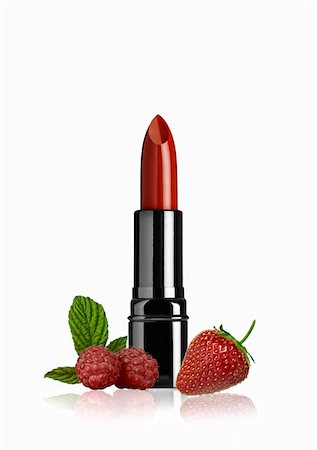 Close up view of red color lip stick on while back Stock Photo - Budget Royalty-Free & Subscription, Code: 400-04289170