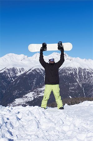 simsearch:400-04289173,k - Man standing with snowboard over his head Stock Photo - Budget Royalty-Free & Subscription, Code: 400-04289171