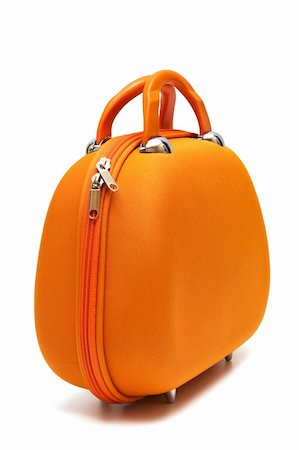 orange large suitcase on a white background Fotografie stock - Microstock e Abbonamento, Codice: 400-04289315