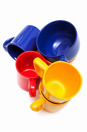 Beautiful color cups on a white background Fotografie stock - Microstock e Abbonamento, Codice: 400-04289531