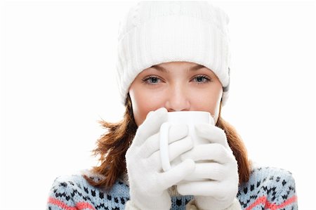 Beautiful woman holding white cup. Isolated over white. Stock Photo - Budget Royalty-Free & Subscription, Code: 400-04289899