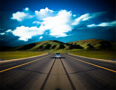 road to the future with the mountain and blue sky background outdoor. Stock Photo - Budget Royalty-Free & Subscription, Code: 400-04280107
