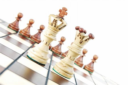 simsearch:400-04775983,k - chess pieces on chess board showing concept for success and power Stock Photo - Budget Royalty-Free & Subscription, Code: 400-04280372