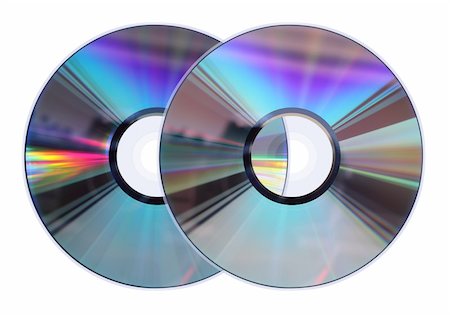 Two CD / DVD disks isolated on white. No scratches or dust. Photographie de stock - Aubaine LD & Abonnement, Code: 400-04280553