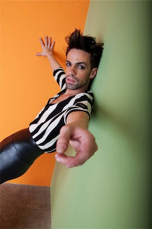 pic gay man dancing - Beautiful man in black and white stripes and leather pants Stock Photo - Budget Royalty-Free & Subscription, Code: 400-04280724