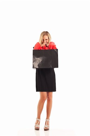 Young woman in black with red and black shopping bag Stock Photo - Budget Royalty-Free & Subscription, Code: 400-04281465