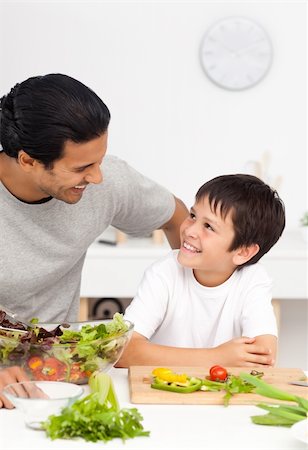simsearch:400-04792006,k - Happy father helping his son in the kitchen at home Stock Photo - Budget Royalty-Free & Subscription, Code: 400-04281664