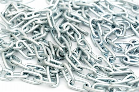 simsearch:400-06070388,k - metallic chain close-up isolated on white background Photographie de stock - Aubaine LD & Abonnement, Code: 400-04282446