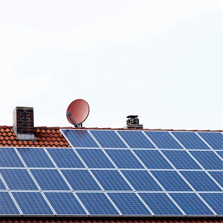 simsearch:400-05380326,k - roof with satellite dish and solar panels Stock Photo - Budget Royalty-Free & Subscription, Code: 400-04283276