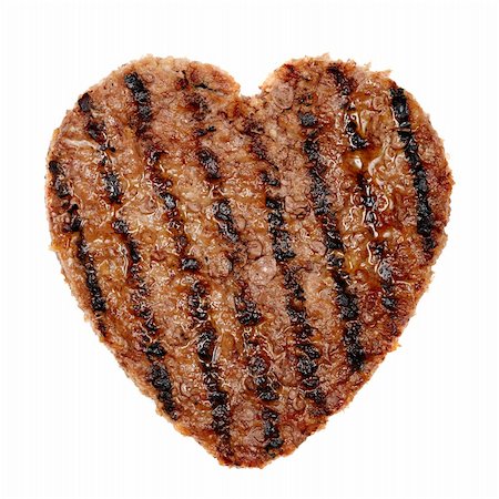 sauteeing - slice of grilled meat in shape of a heart Photographie de stock - Aubaine LD & Abonnement, Code: 400-04283298