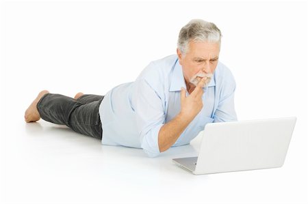 elderly doubt - elderly man using laptop Stock Photo - Budget Royalty-Free & Subscription, Code: 400-04283395