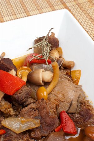simmering - Homemade beef stew with mushrooms, traditional goulash Stock Photo - Budget Royalty-Free & Subscription, Code: 400-04283698