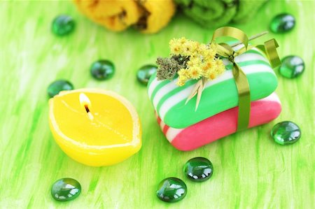 simsearch:400-04501066,k - Striped soap against the green background the candle Stock Photo - Budget Royalty-Free & Subscription, Code: 400-04283775