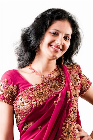designer indian garment - smiling Indian happy woman wearing  beautifully embroidered sari Stock Photo - Budget Royalty-Free & Subscription, Code: 400-04294040