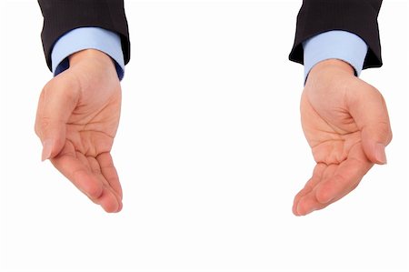 Businessman 's hand holding something and isolated on white background Photographie de stock - Aubaine LD & Abonnement, Code: 400-04294066