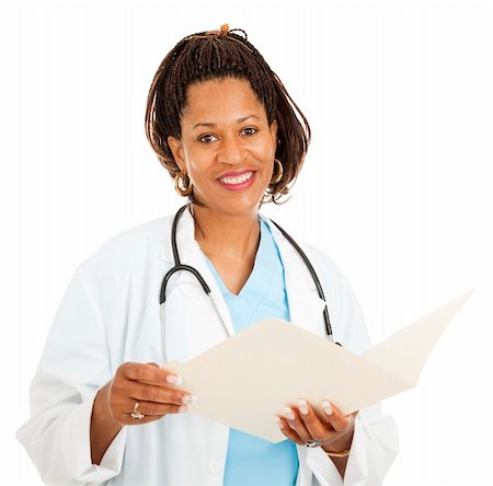 Beautiful african-american female doctor reading a patient's medical chart.  Isolated on white. Stock Photo - Budget Royalty-Free & Subscription, Code: 400-04294132
