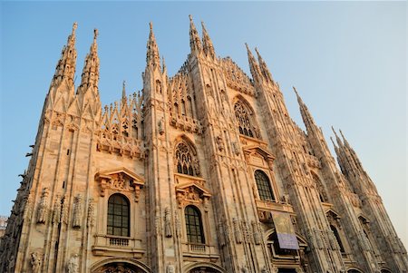 duomo milano - Front view of so famous Milan cathedral, also known as "Duomo", meaning "God's house" Stock Photo - Budget Royalty-Free & Subscription, Code: 400-04294339