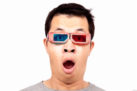 silly accident - Young man with 3D glasses on watching a 3D movie Stock Photo - Budget Royalty-Free & Subscription, Code: 400-04294551