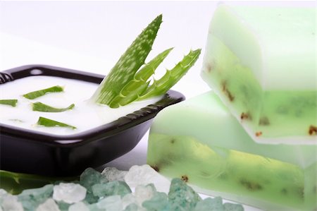 Aloe vera leaves, handmade soap, moisturizer and bath salt Stock Photo - Budget Royalty-Free & Subscription, Code: 400-04295019