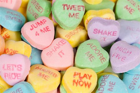 Heart shaped candy with sayings on it. Horizontal shot. Stock Photo - Budget Royalty-Free & Subscription, Code: 400-04295011