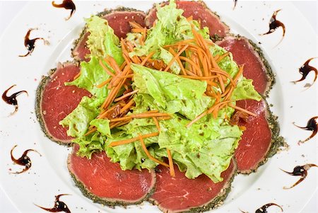 simsearch:400-04284643,k - red beef sliced meat with greens closeup Stock Photo - Budget Royalty-Free & Subscription, Code: 400-04295174