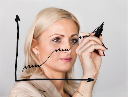 people looking at graphs - Businesswoman drawing growth chart on the sceeen Stock Photo - Budget Royalty-Free & Subscription, Code: 400-04295363