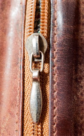 an image of zipper on brwon leather Stock Photo - Budget Royalty-Free & Subscription, Code: 400-04295512