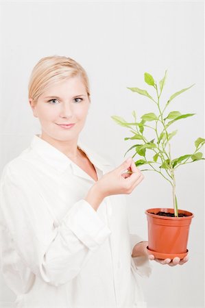 pretty female botanic scientist with plant Photographie de stock - Aubaine LD & Abonnement, Code: 400-04295599