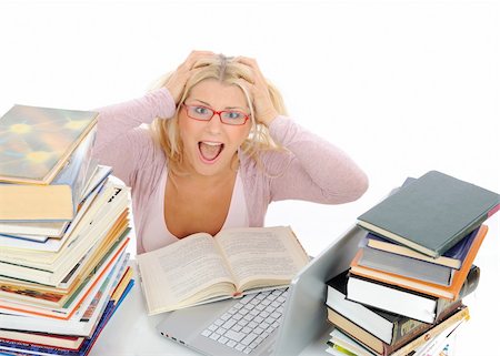 young pretty tired student girl with lots of books in panic. isolated on white background Stock Photo - Budget Royalty-Free & Subscription, Code: 400-04295622