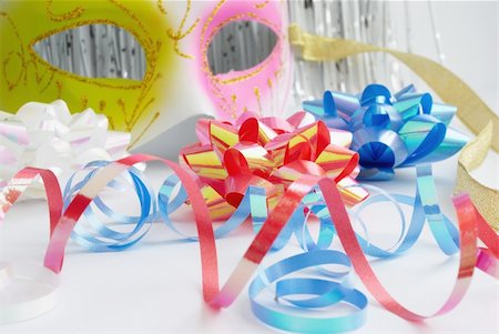 Carnival mask and decorative bows on a white background Stock Photo - Budget Royalty-Free & Subscription, Code: 400-04295791