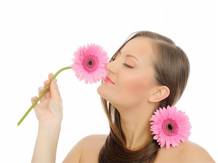 simsearch:400-04881816,k - Beautiful woman with pure healthy skin and long hair with 2 pink flowers. isolated on white background Stockbilder - Microstock & Abonnement, Bildnummer: 400-04295914