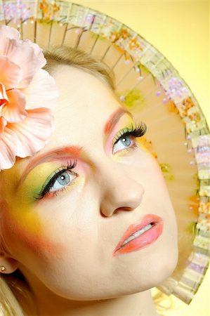 simsearch:400-08096297,k - Close-up portrait of summer fashion creative eye make-up in yellow and green tones Stock Photo - Budget Royalty-Free & Subscription, Code: 400-04295938